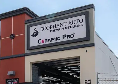 Ecophant Auto Premium Detailing and Ceramic Pro sign on the Boca Raton studio, a Ceramic Pro Elite Dealer